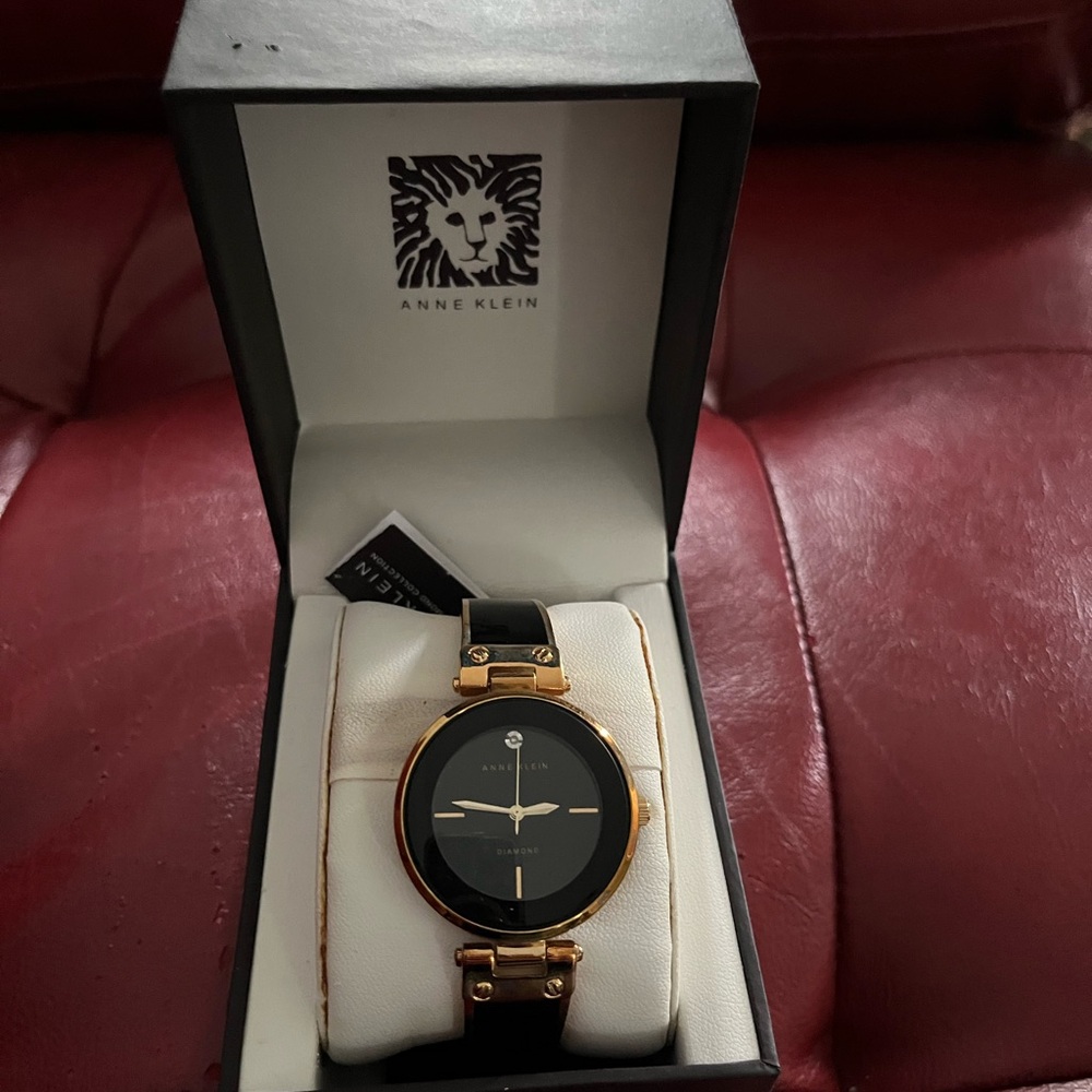 Anne Klein Black and Gold Watch Modern Design
